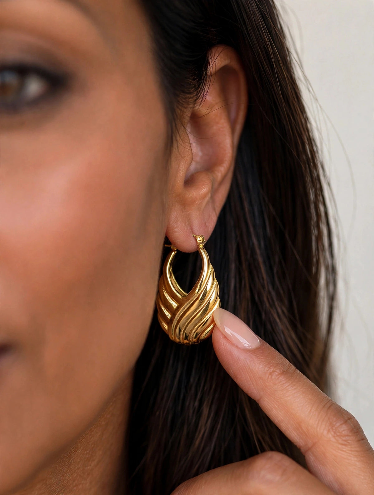 Simply Chic Hoops, 18K gold-plated teardrop hoop earrings with a swirling rib pattern, view 3 of 8
