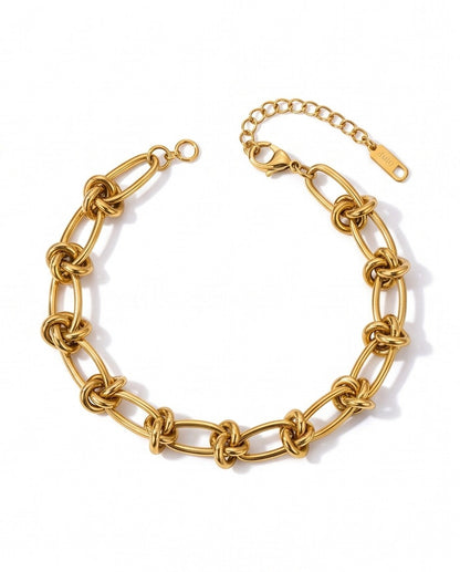 Ennvy Accessories Poised Bracelet: gold-plated stainless steel chain with knot detailing and lobster clasp.